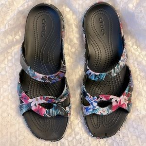 Crocs sandals, black and floral, size 10w